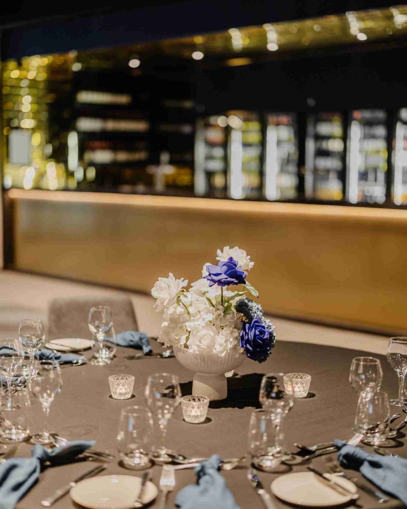 vase of flowers on event table